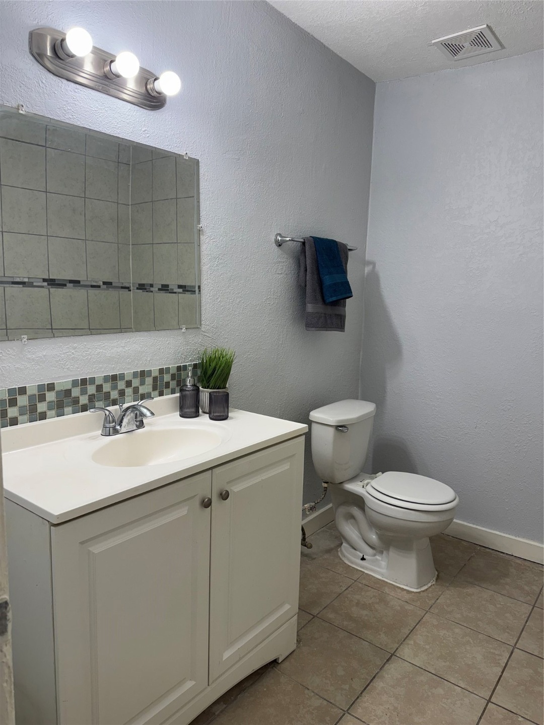 Sleek, stylish bathroom with contemporary upgrades