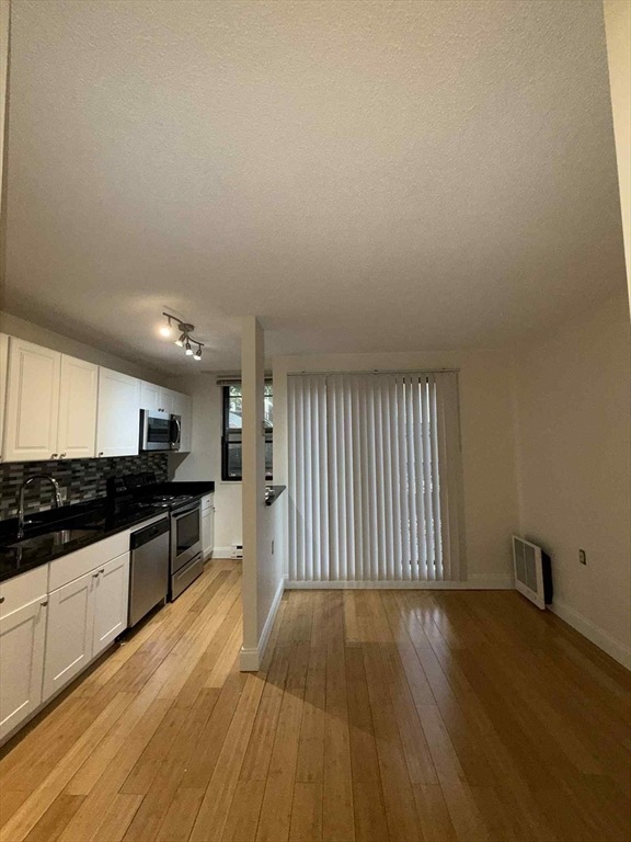 118 Centre St unit 118, Brookline, MA 02446 - photo 1