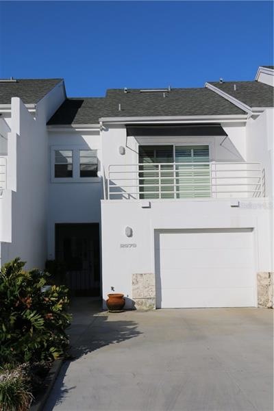 Front photo with Master bedroom balcony over garag
