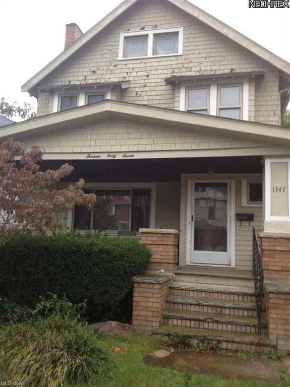 Full width front porch classic colonial with all the original bells and whistles.