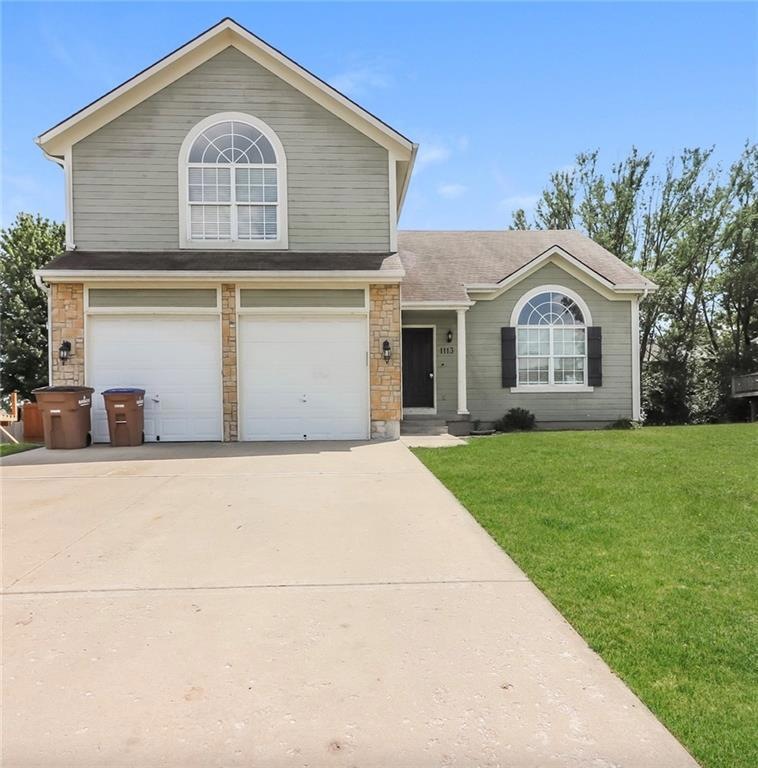 1113 Manse Dr, Raymore, MO 64083 - photo 1