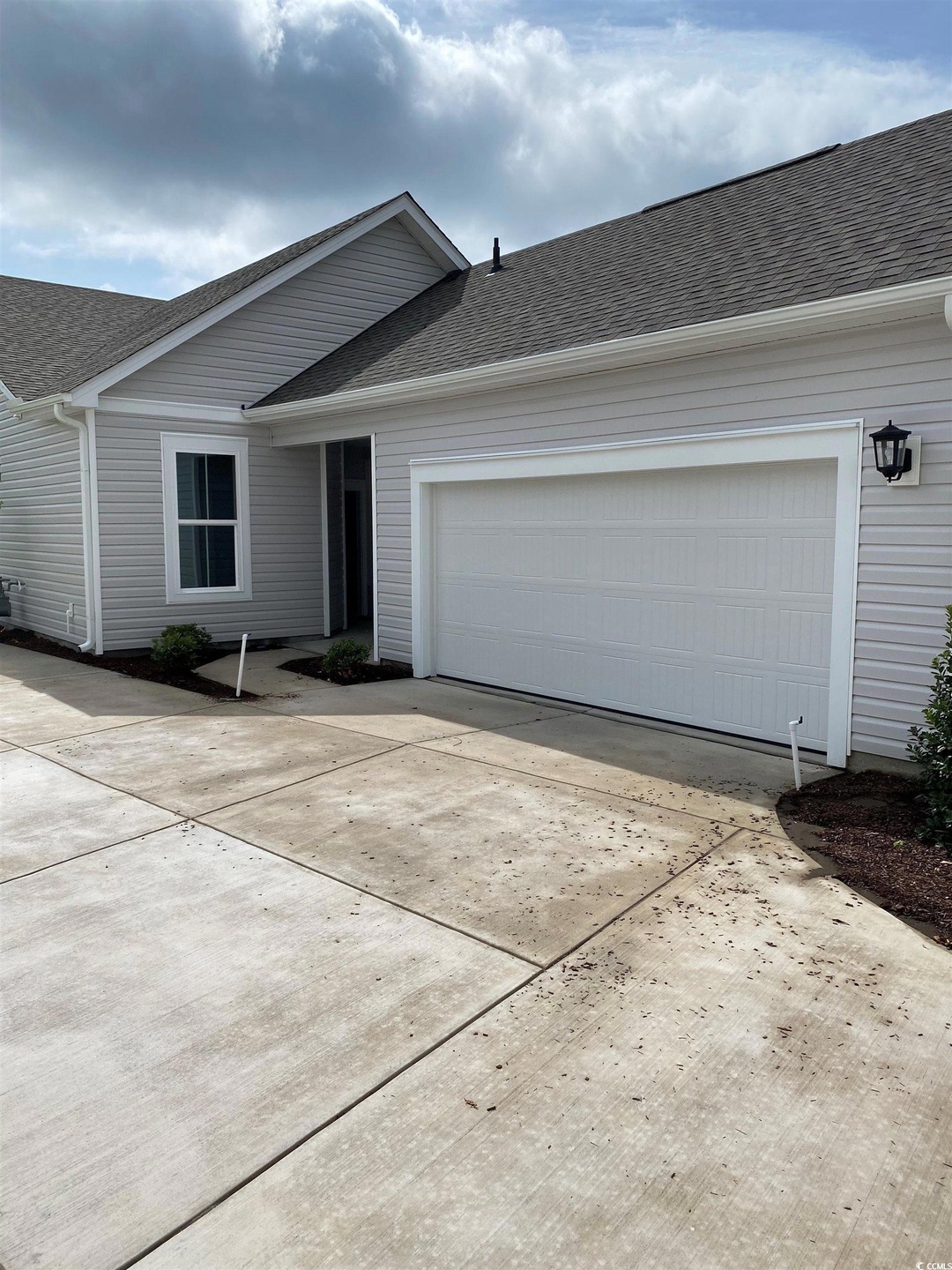 Ranch-style home featuring a garage