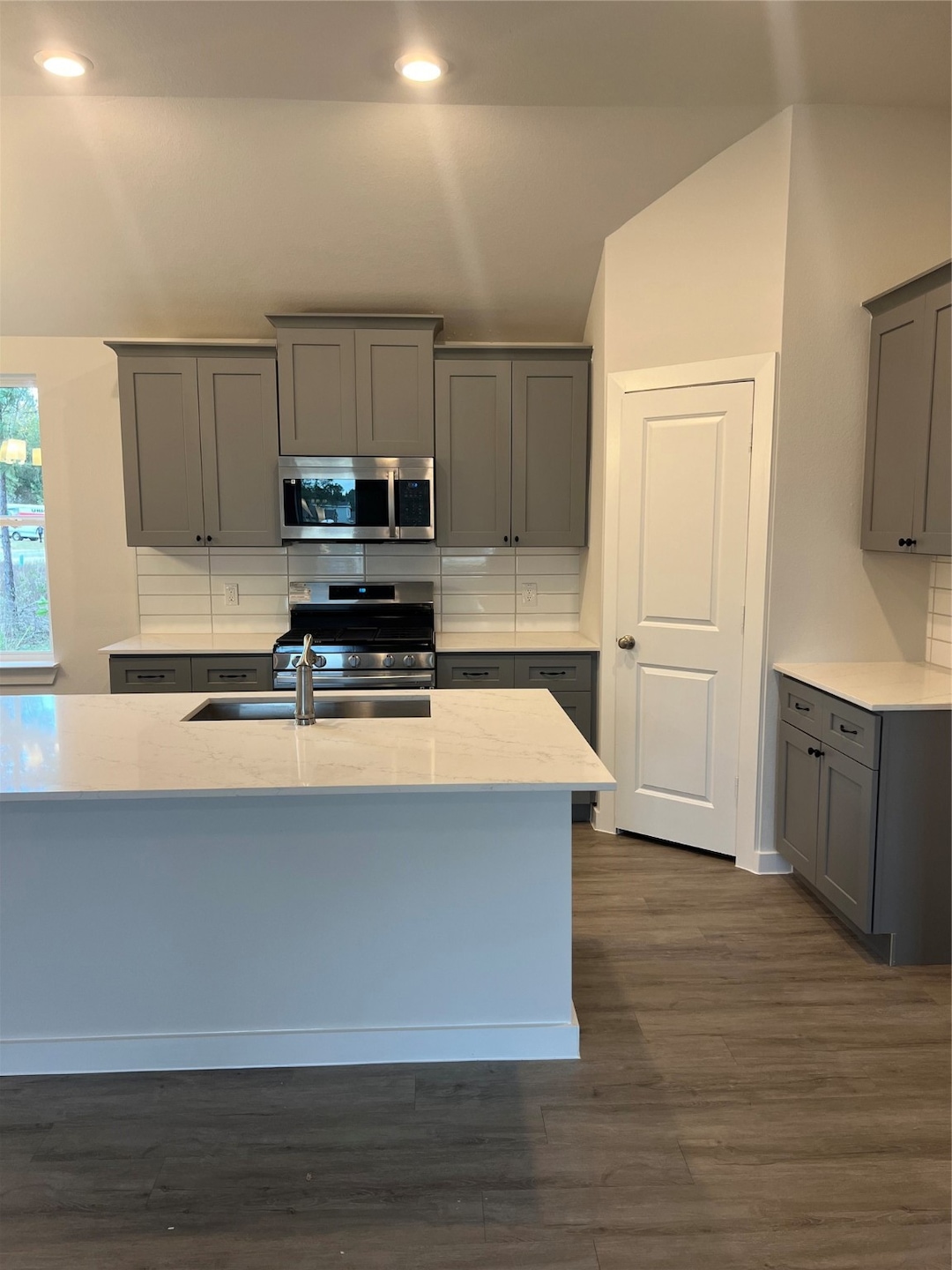 The open-concept layout creates a seamless flow, m