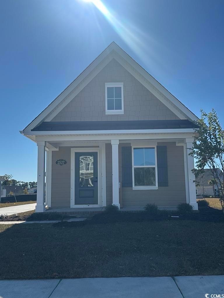 View of front facade featuring a porch