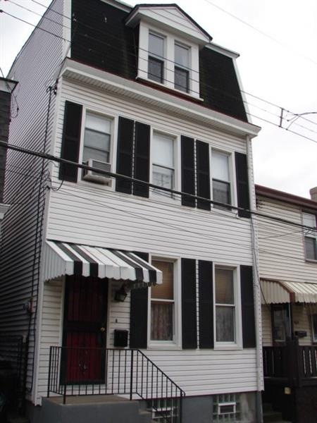 Welcome to 4616 Carroll Street!  This property is a full three story old style with original details including doors and baseboards, tin ceiling and claw foot tub.