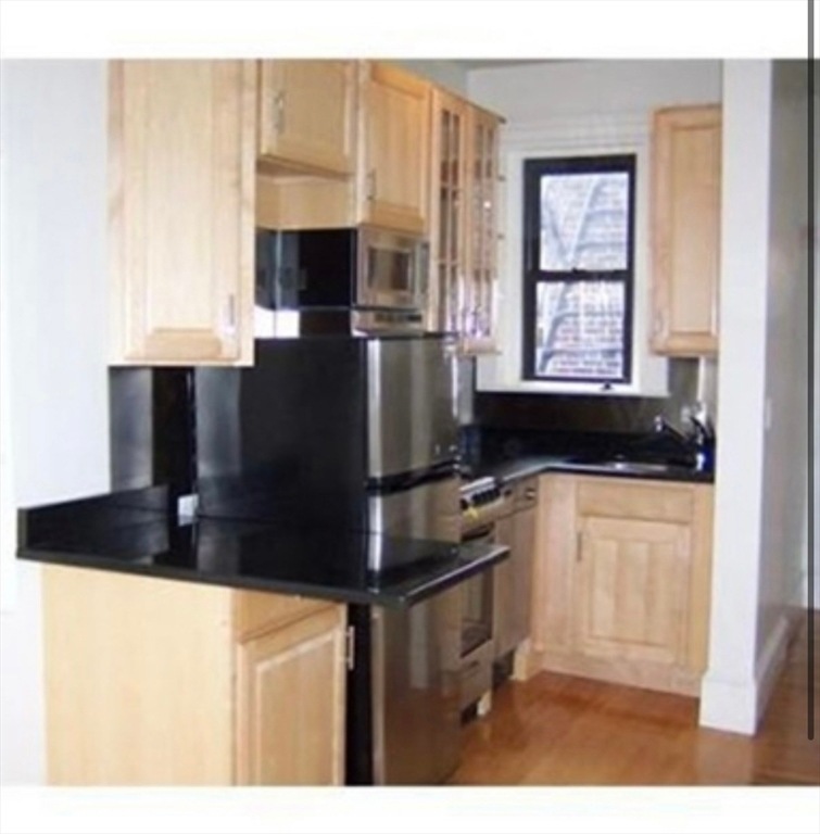 75 Burbank St unit 404, Boston, MA 02115 - photo 1