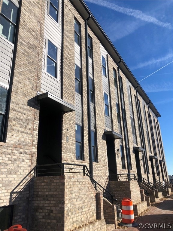 Modern exterior with brick front stoops