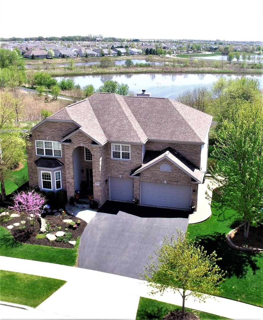 Gorgeous brick exterior, backs to ponds and paths,