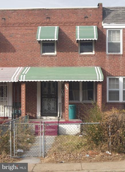 902 Whitmore Ave, Baltimore, MD 21216 - photo 1