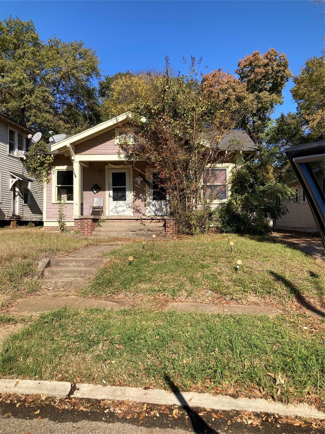 View of front of home featuring covered porch