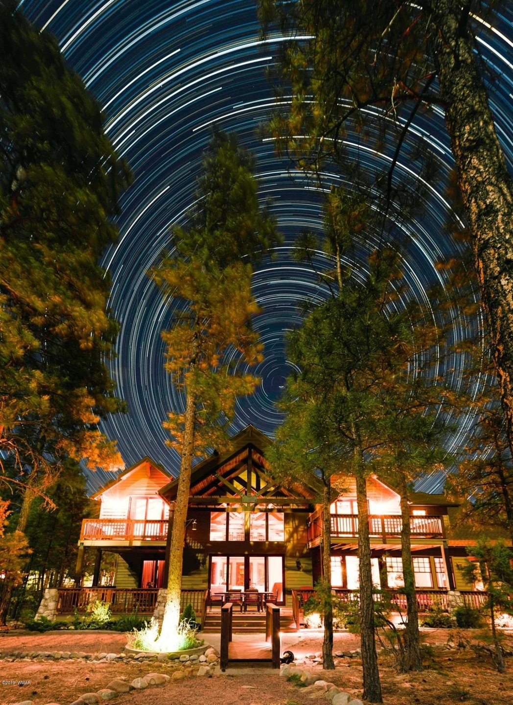 Professional Photo with time lapse stars