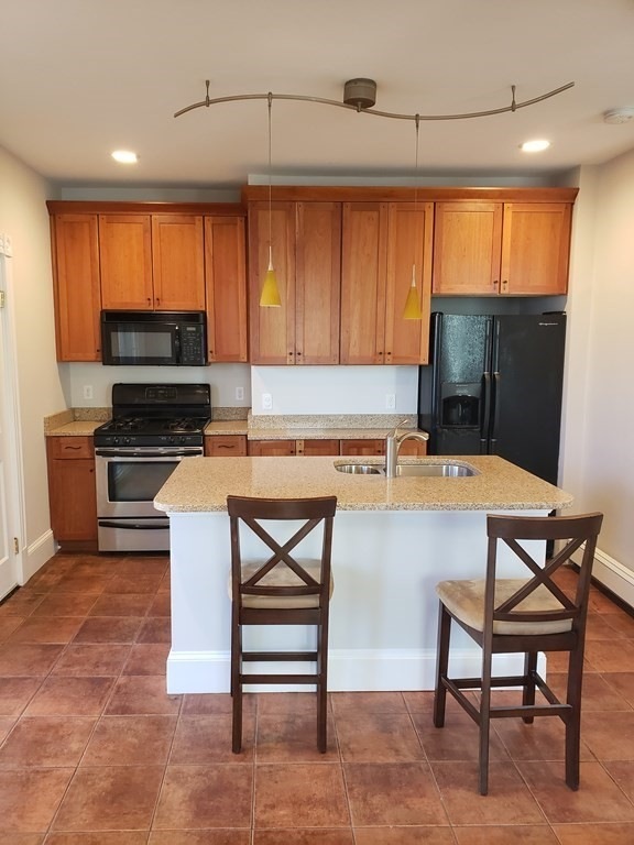 5 Carlisle St unit 2, Cambridge, MA 02139 - photo 1