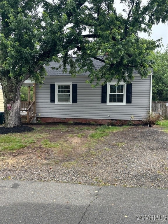 View of front of home with crawl space