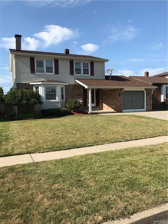 Front of house,  open covered porch, nicely landsc