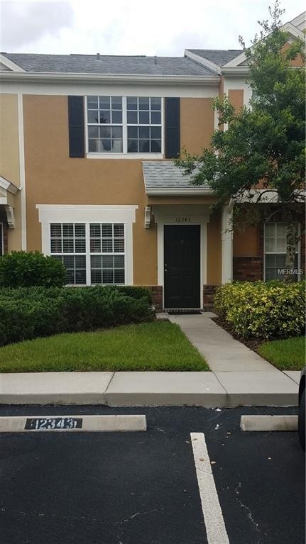 Front of home and assigned parking space 12343