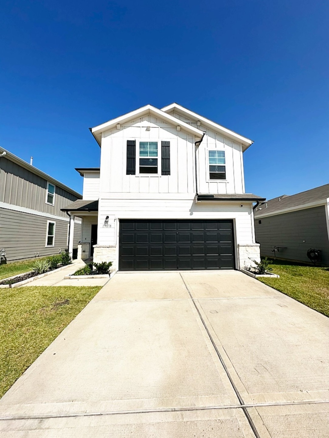 This is a modern two-story home featuring a fresh