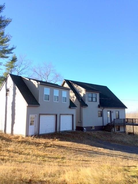 Front of home and detached garage