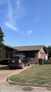 View of front of house featuring a front yard