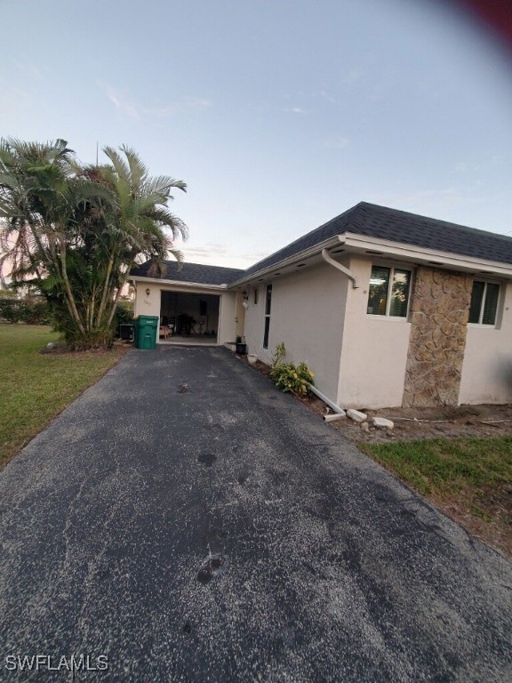 Ranch-style home with a carport