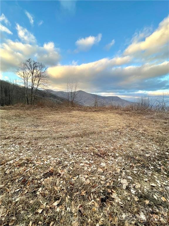This cleared lot shows off all these magnificent surrounding mountain views.