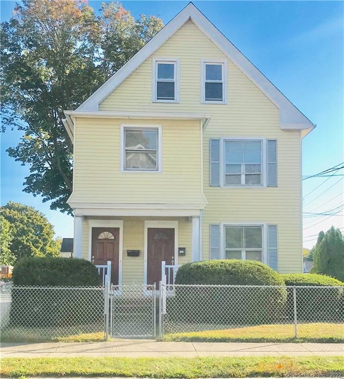 Lovely, well manicured 2 family on a corner lot.