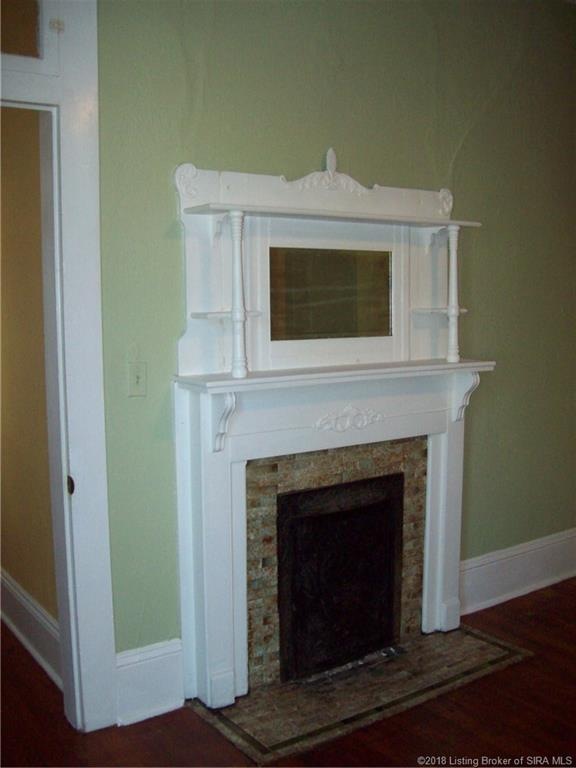 Original fireplace with gorgeous tile work