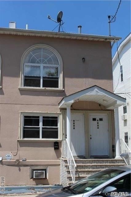 9522 86th St unit Upper, Ozone Park, NY 11416 - photo 1