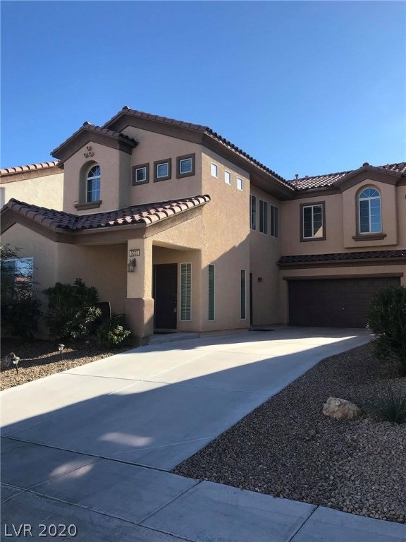 Extended driveway with 2 car garage.
