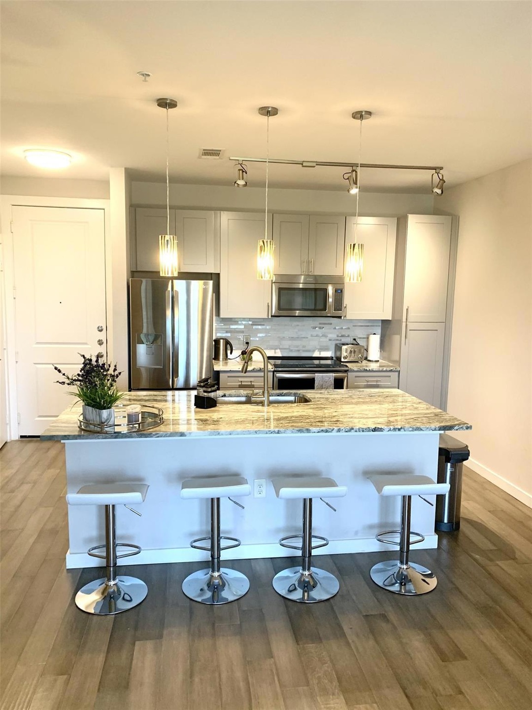 Kitchen featuring appliances with stainless steel