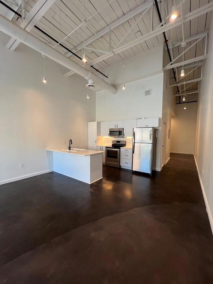 Kitchen featuring appliances with stainless steel 