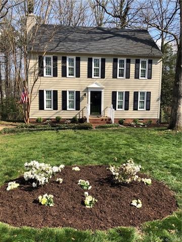 Front Exterior. Freshly painted w/some hardboards 