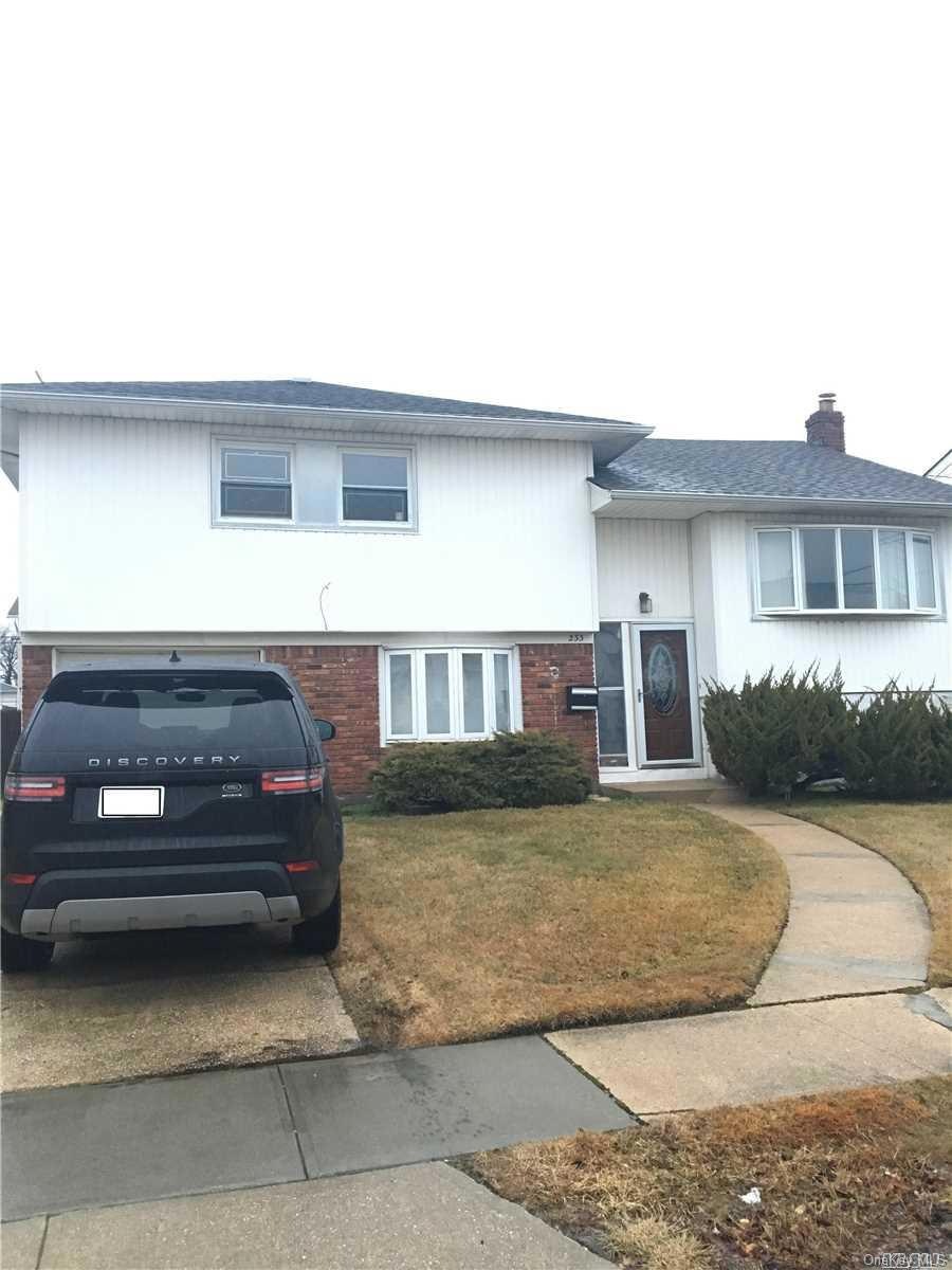 233 Delaware Ave, Island Park, NY 11558 - photo 1