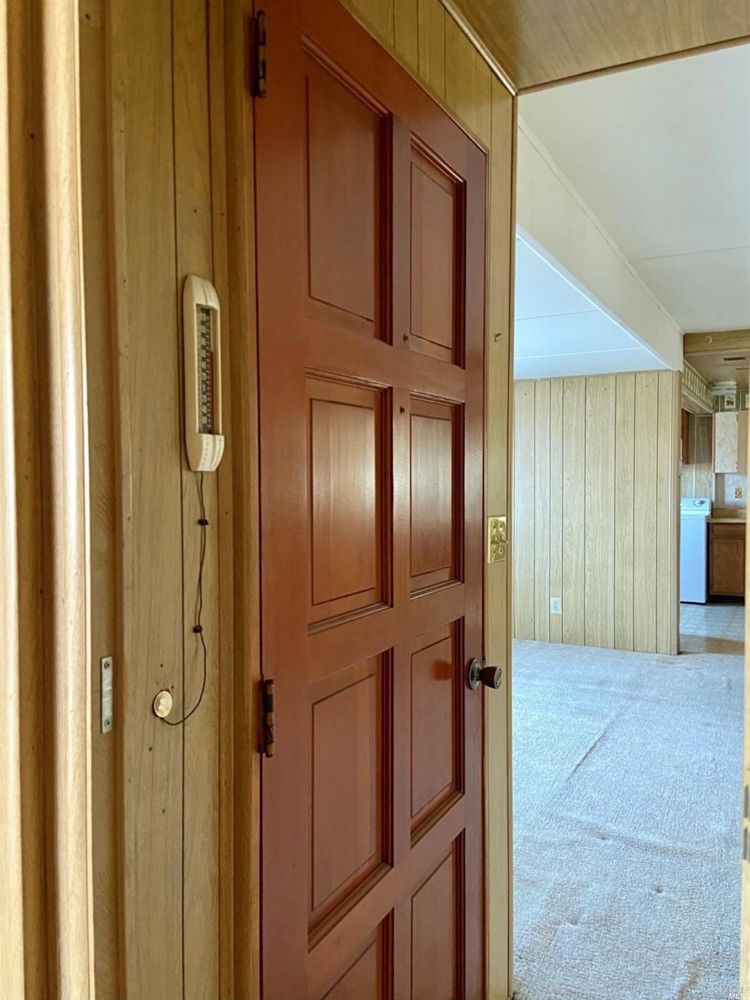 Enter to a spacious living room.