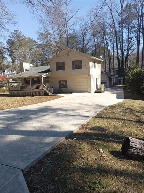 Front of property with a garage from the street
