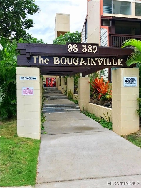 Walkway to pool and BBQ area.