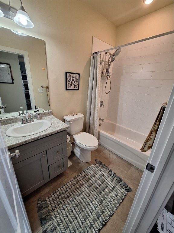 Full bathroom featuring vanity, toilet, shower / b