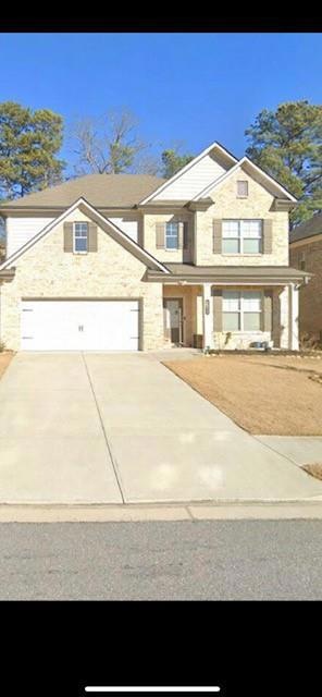 View of front facade with a garage