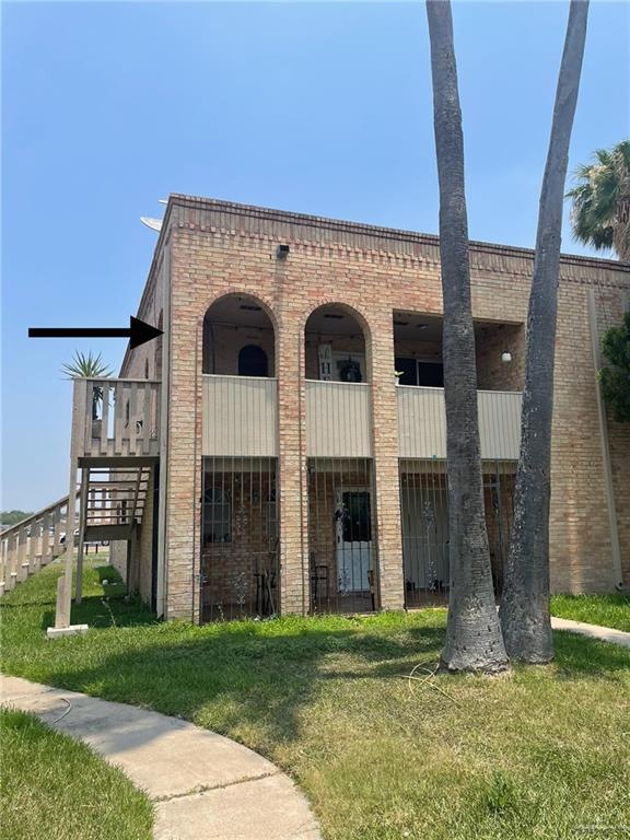 View of building exterior featuring stairway