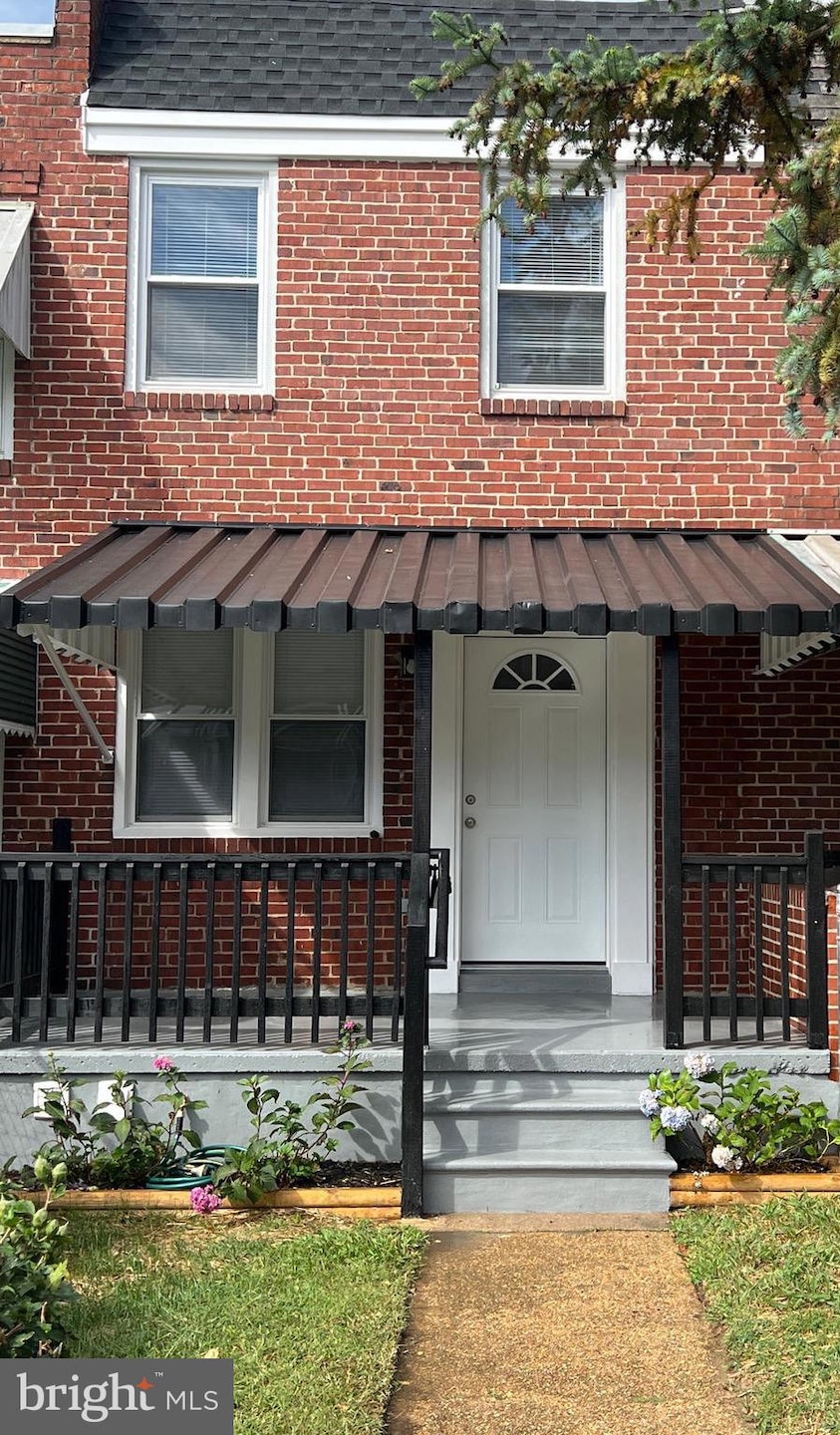 912 Whitmore Ave, Baltimore, MD 21216 - photo 1