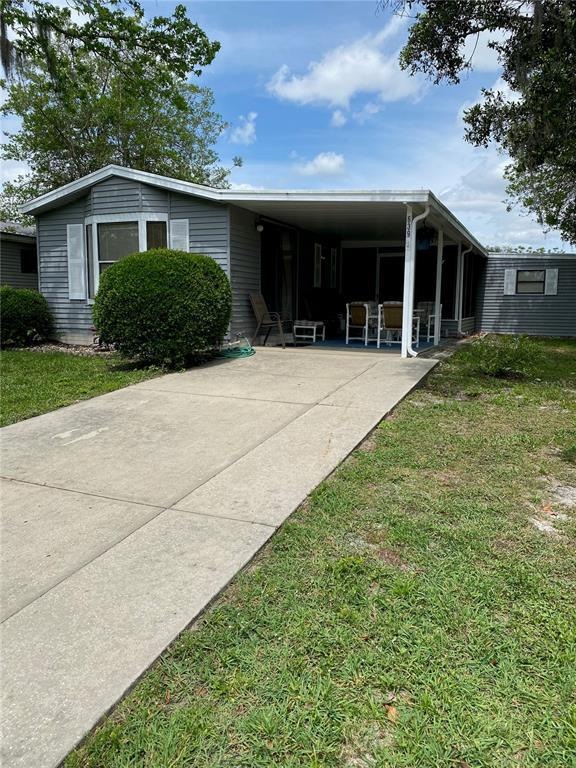 COVERED CARPORT AND ADDITIONAL GOLF CART PARKING A