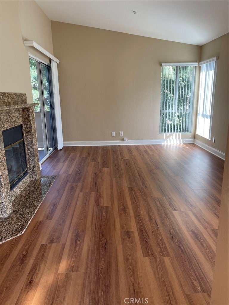 BRAND NEW LAMINATE THROUGHOUT THE LIVING ROOM.