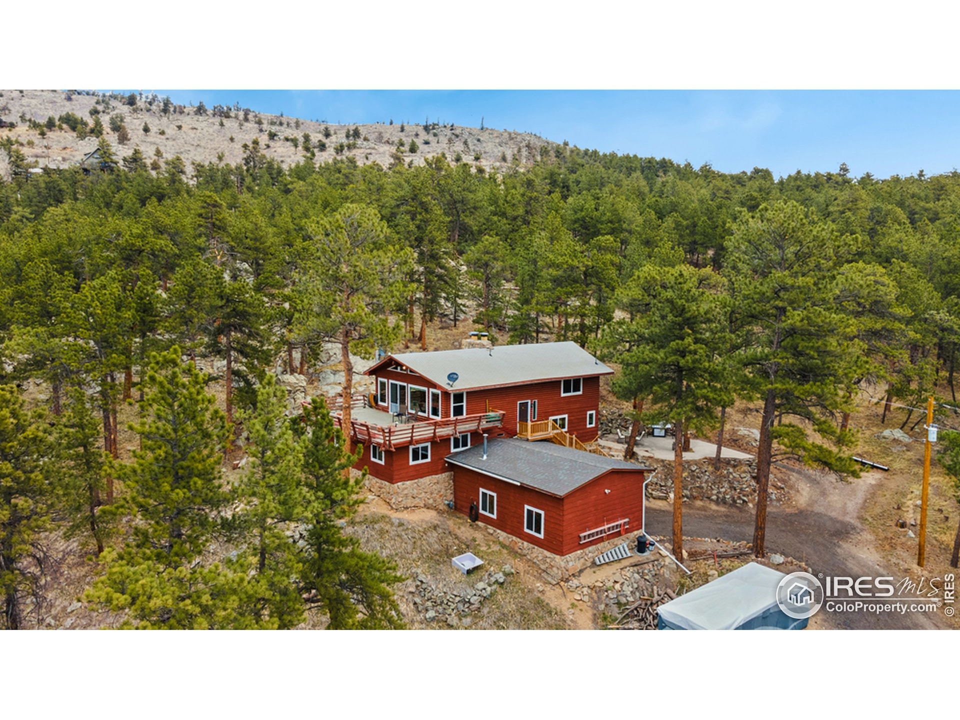 Welcome to your new alpine home in the woods on nearly 2 acres of land!