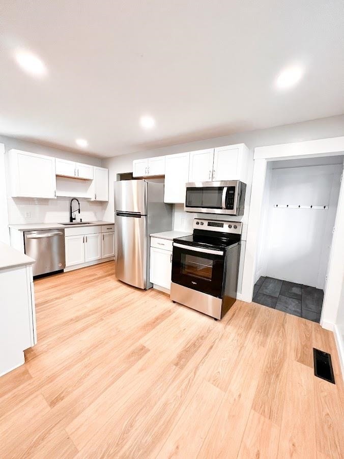 178 Pleasant St unit 1, Claremont, NH 03743 - photo 1