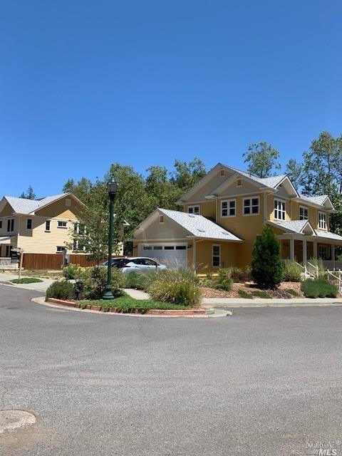The available lot is just to the left of the home 