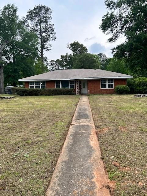 View of front of property with a front lawn