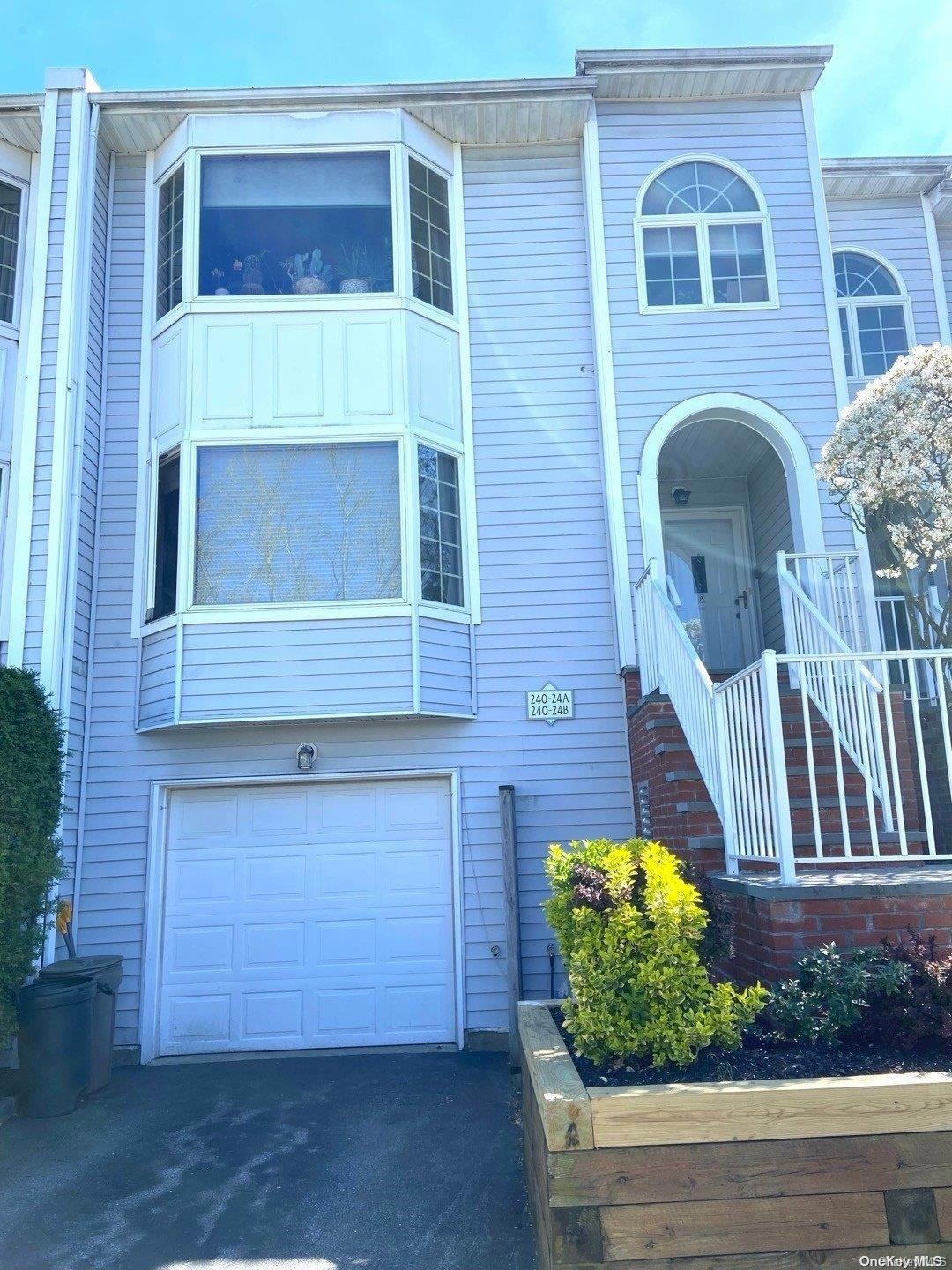 240-24 Oak Park Dr unit 28A, Little Neck, NY 11362 - photo 1