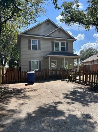View of front of property with fence private yard