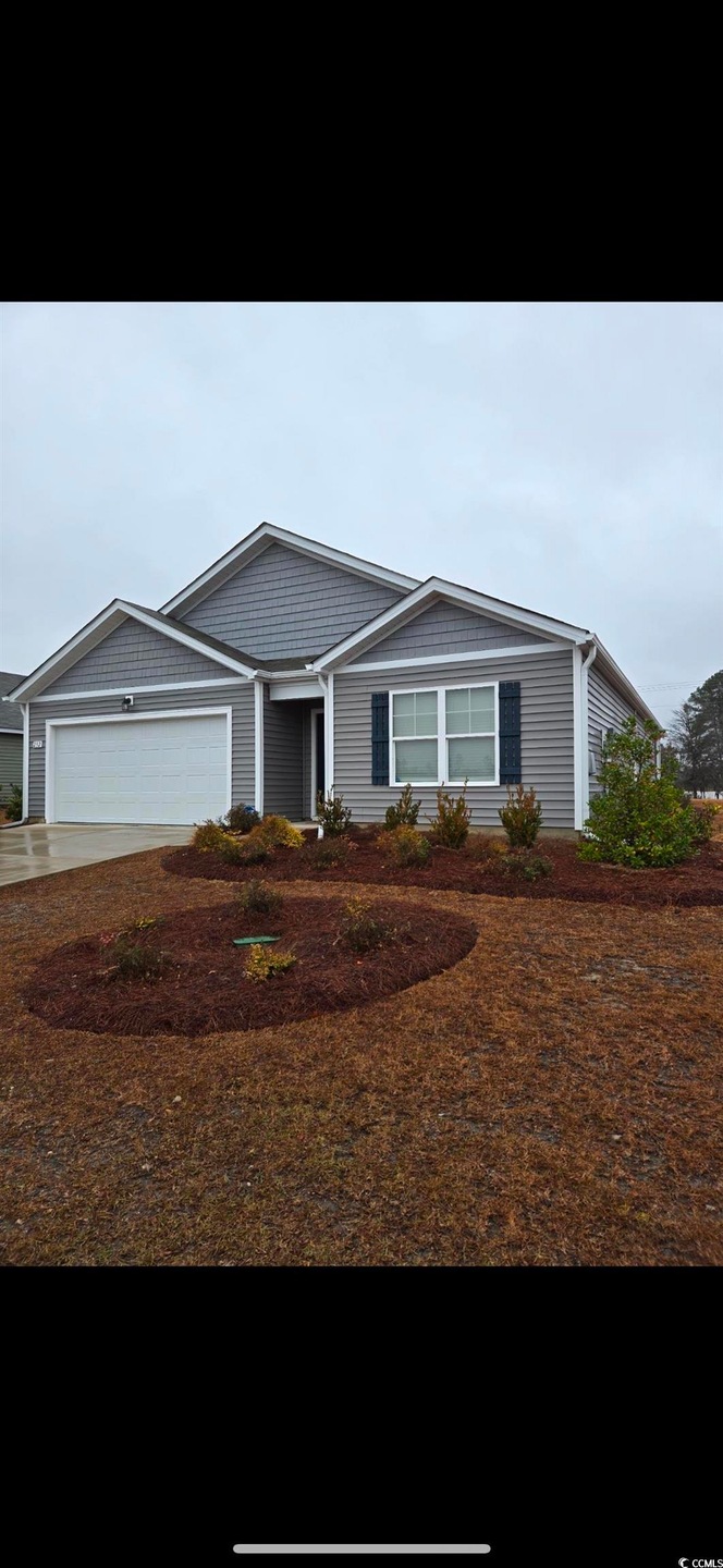 Single story home with a garage