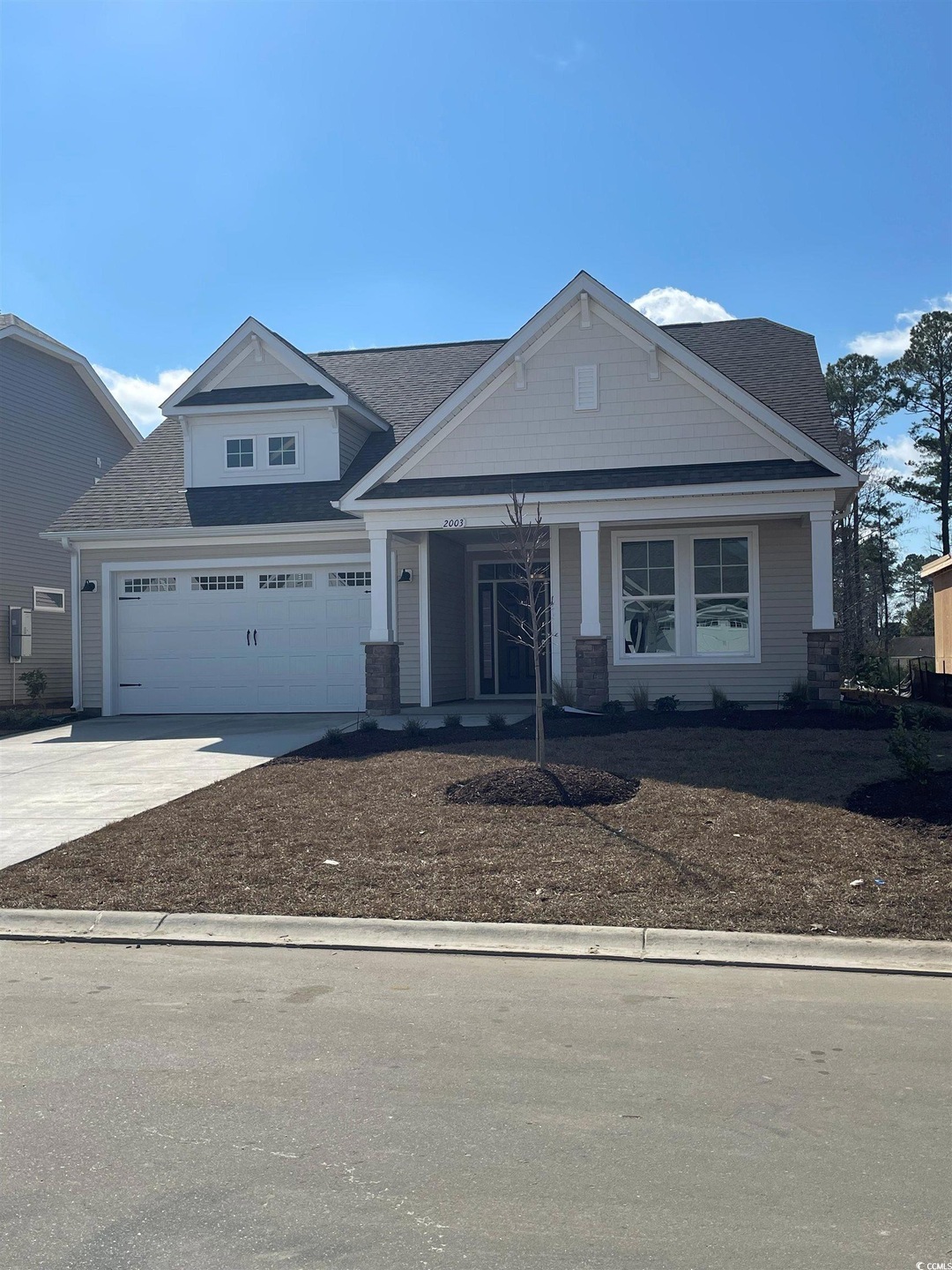View of front of home with a garage