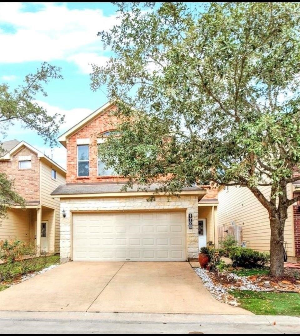 Front of home in this beautiful gated community